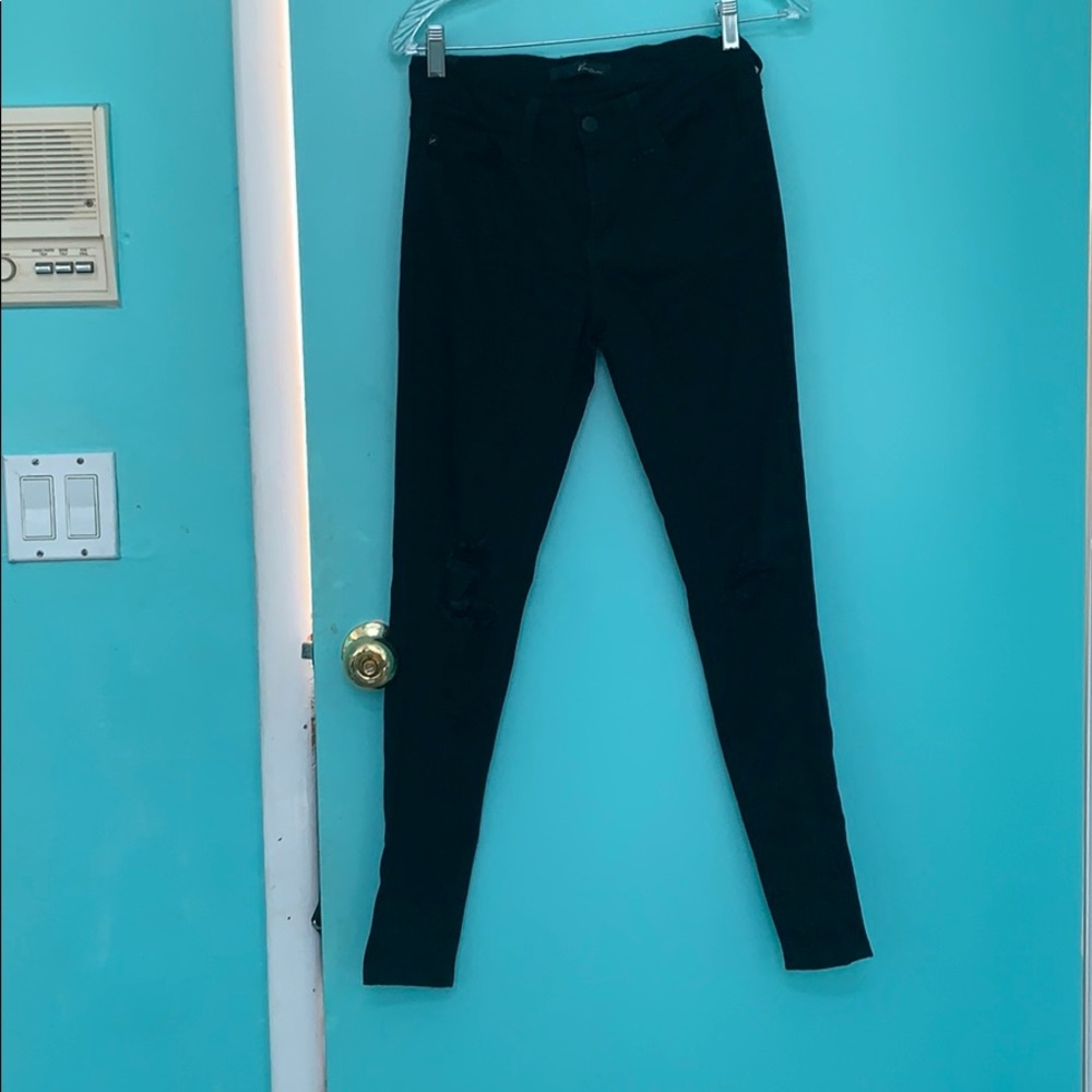 Black skinny jeans with rips on knees